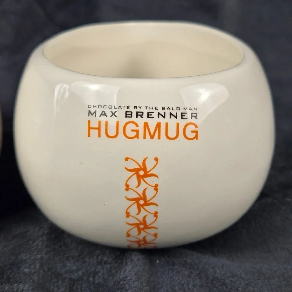 Pair of Chocolate by the Bald Man Max Brenner Hug Mugs White Ceramic
